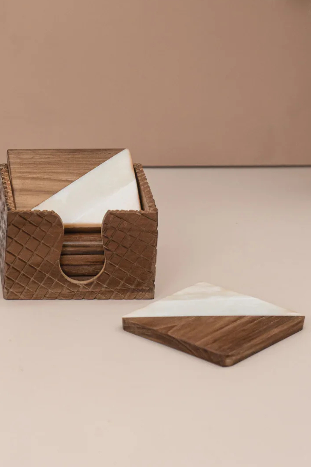 Bone Coasters Set displayed on a wooden table, showcasing their elegant design