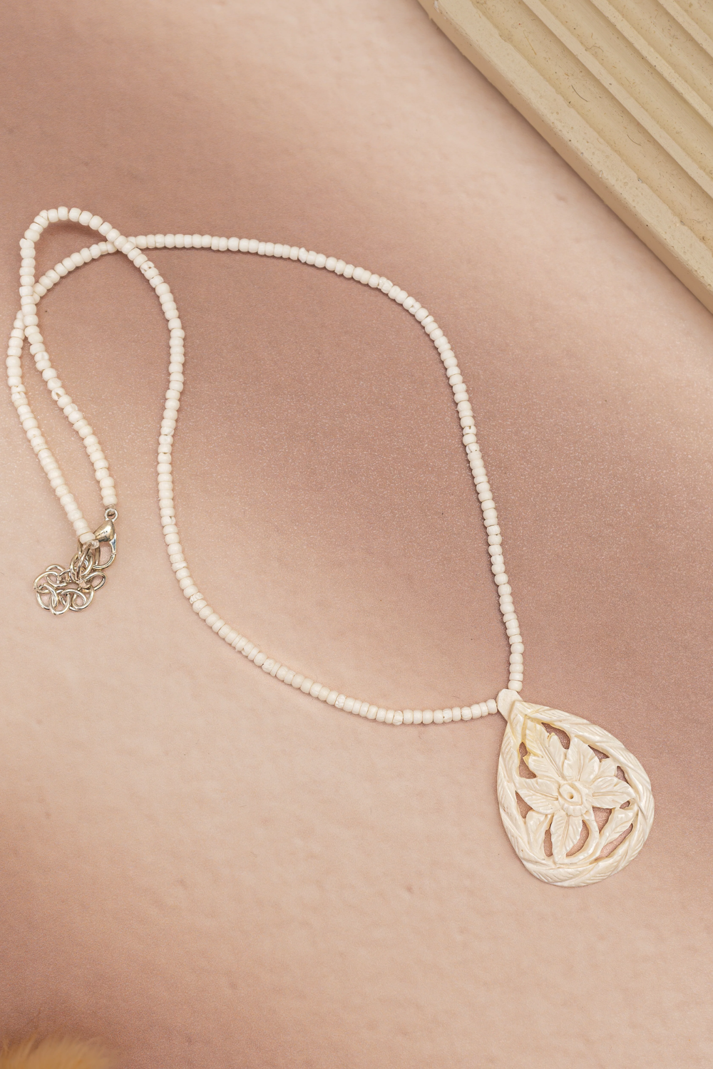 Hand Carved Bone Flower Pendant Necklace