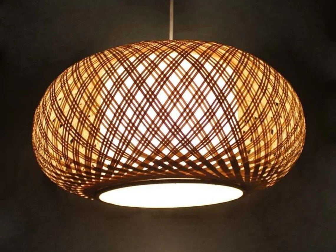 Handcrafted Traditional Rattan Pendant Light hanging in a cozy living room.